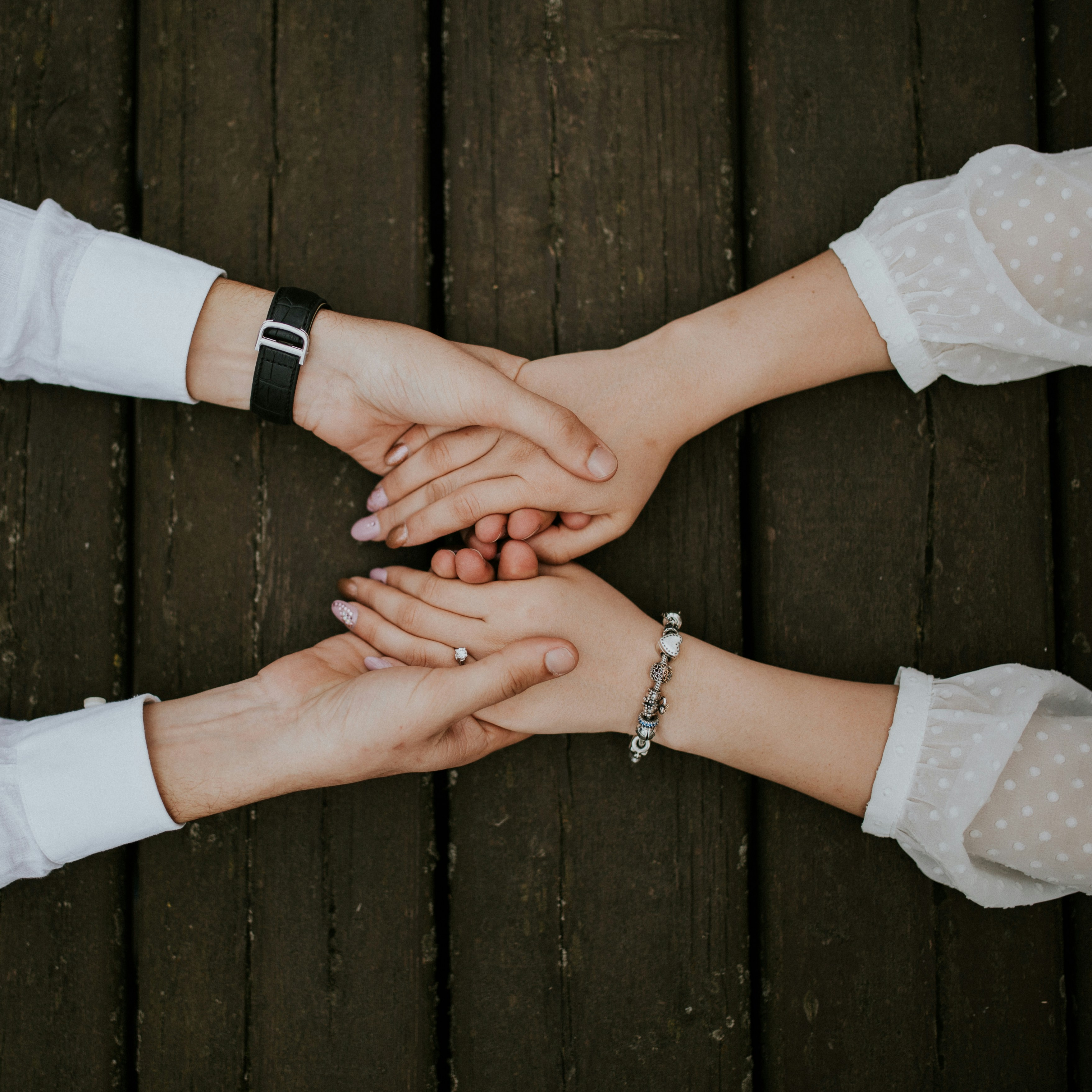 Friends offering comfort to one another